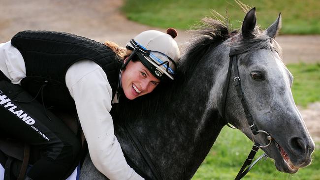 Francesca Cumani with her favourite stable horse Bauer after trackwork.