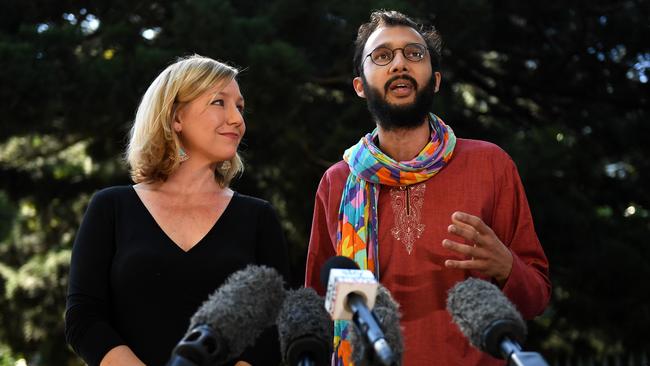 Brisbane City Councillor Jonathan Sri, right, as Larissa Waters announced her resignation. Picture: AAP.