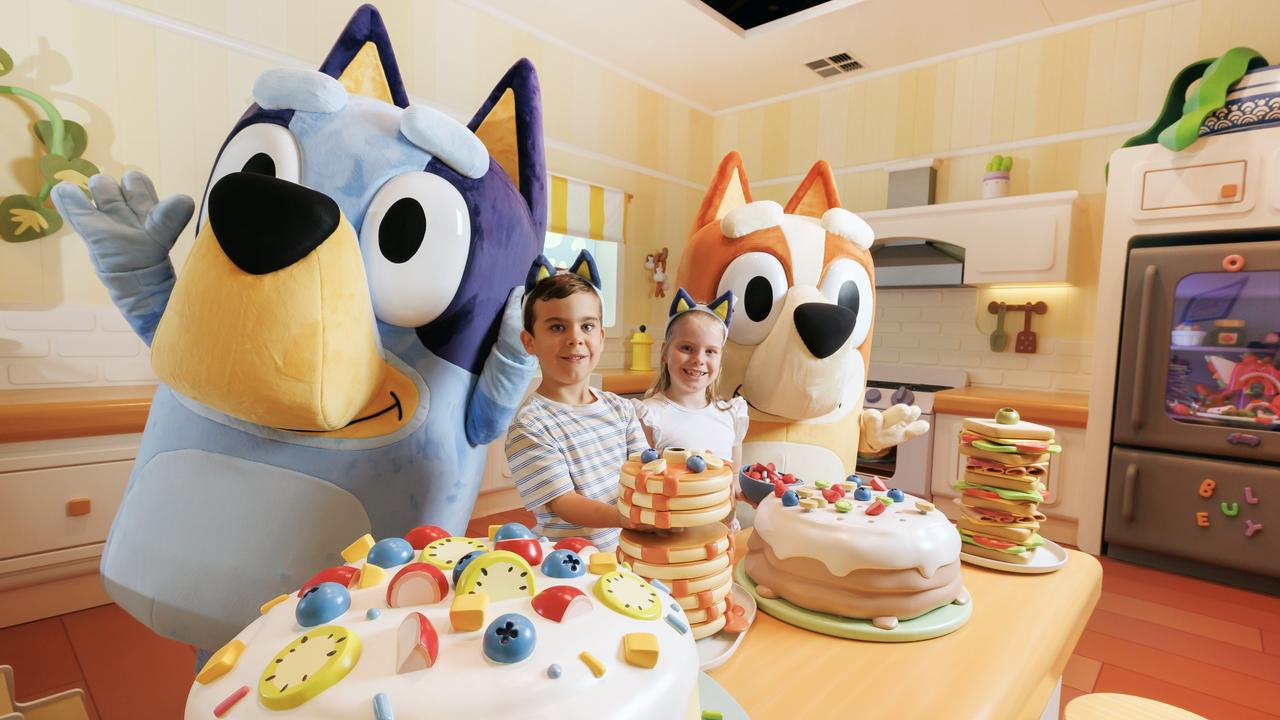 Siblings Samuel 6 and Ava Wallis 8, get a sneak preview in the kitchen of Blueys World at Northshore Pavilion at Hamilton. Picture Lachie Millard