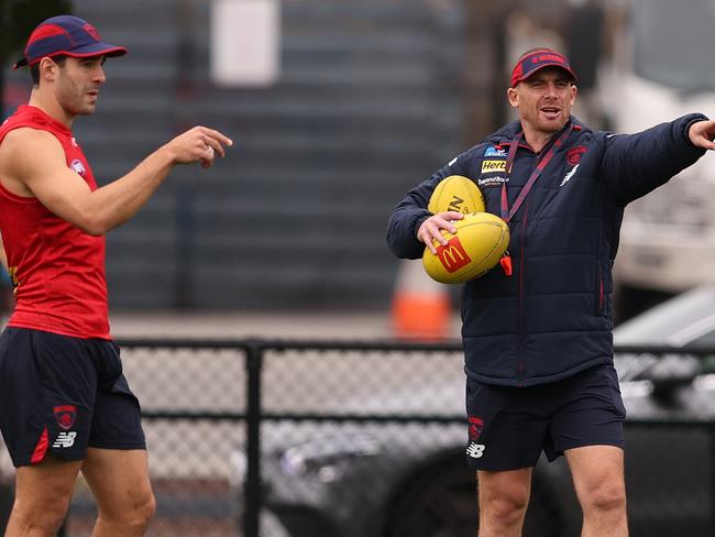 MELBOURNE, AUSTRALIA - APRIL 10: Simon Goodwin, Senior Coach of the Demons reacts during a Melbourne Demons AFL training session at Gosch's Paddock on April 10, 2024 in Melbourne, Australia. (Photo by Robert Cianflone/Getty Images)