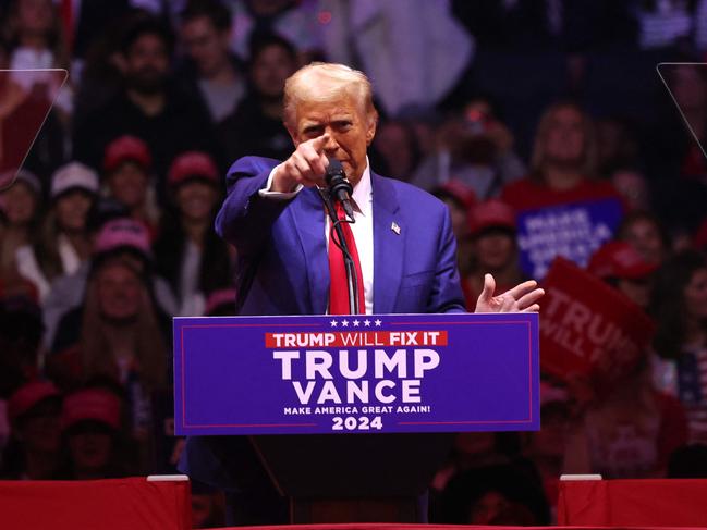 Supporters cheered on Donald “Captain America” Trump. Picture: AFP