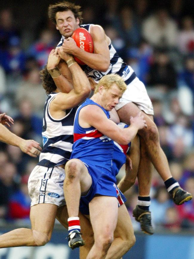 Jimmy Bartel crashes the pack.