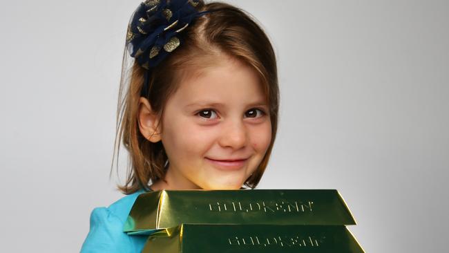 Iris aged 5yrs old with chocolate gold, pictured in NewsCorp studio, Surry Hills.