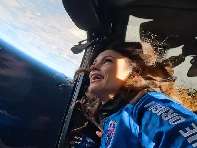 “Space tourist” and famous aerospace engineer Emily Calandrelli received hateful comments when video of her reaction to seeing Earth from space was posted online. Picture: @TheSpaceGal/X