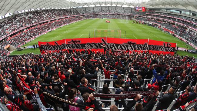 The Red and Black Block cheer on the Wanderers during their A-League round one clash with Central Coast Mariners. Picture: Getty Images