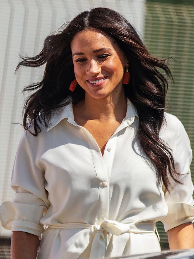 She wore this white number while in Tembisa township, Johannesburg. Picture: Michele Spatari/AFP