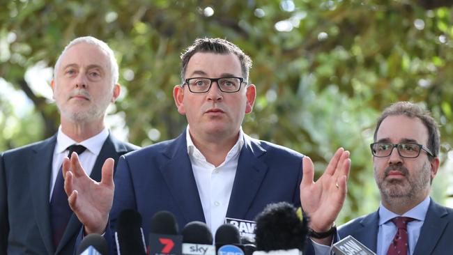 Premier Daniel Andrews faces the media with Special Minister of State Gavin Jennings and Attorney-General Martin Pakula by his side. Picture: Alex Coppel