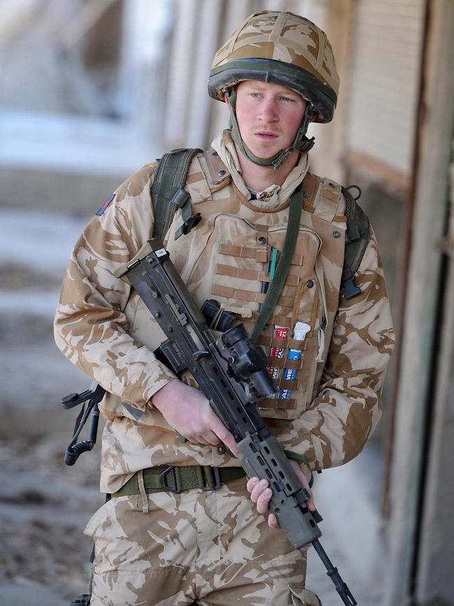 Harry on patrol through the deserted town of Garmisir in Southern Afghanistan.