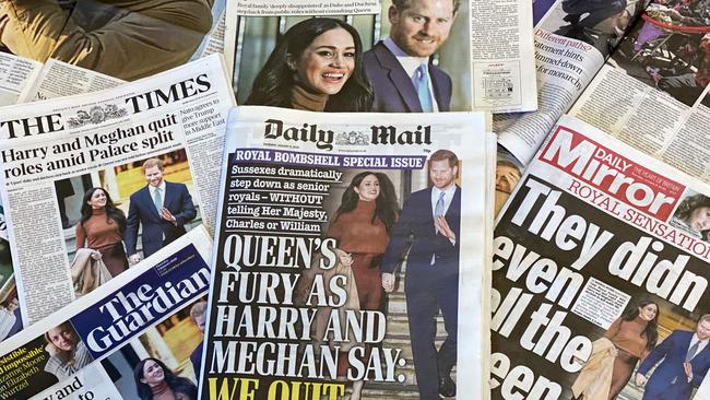 UK newspaper coverage of Harry and Meghan’s decision to step back from senior royal duties. Picture: AFP