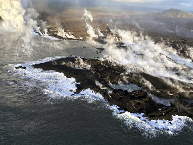 New land formed by lava from Kilauea Volcano where the bay and village of Kapoho once stood on the island of Hawaii. Picture: U.S. Geological Survey via AP