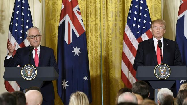 Malcolm Turnbull and Donald Trump speak in the East Room of the White House. Picture: AFP/Saul Loeb