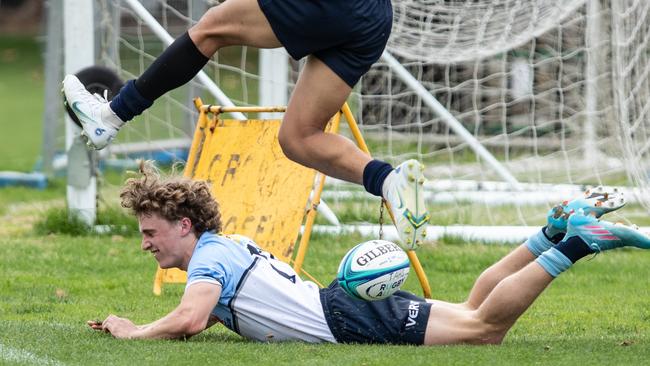 Charlie Poynton scores in the National U16 round three match.