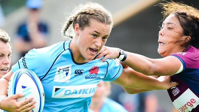 Arabella McKenzie playing for NSW against Queensland.