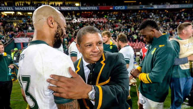 Lionel Mapoe of the Springboks and coach Allister Coetzee celebrate after beating Ireland.