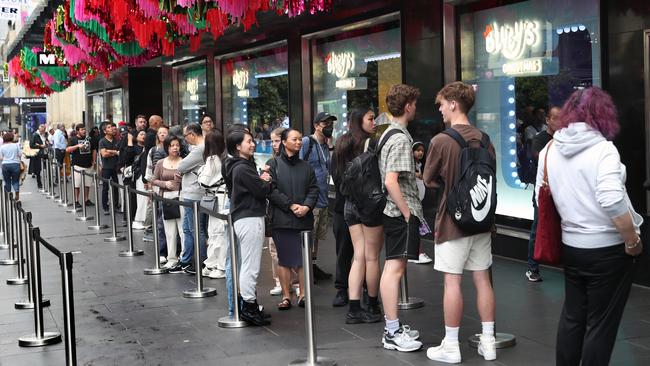 Shoppers queue outside Myer before the doors opened at 8am. Picture: David Crosling