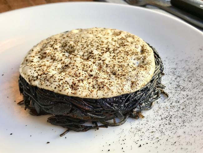 Ester’s squid ink noodles, caramelised yoghurt and potato dish. Picture: Jenifer Jagielski