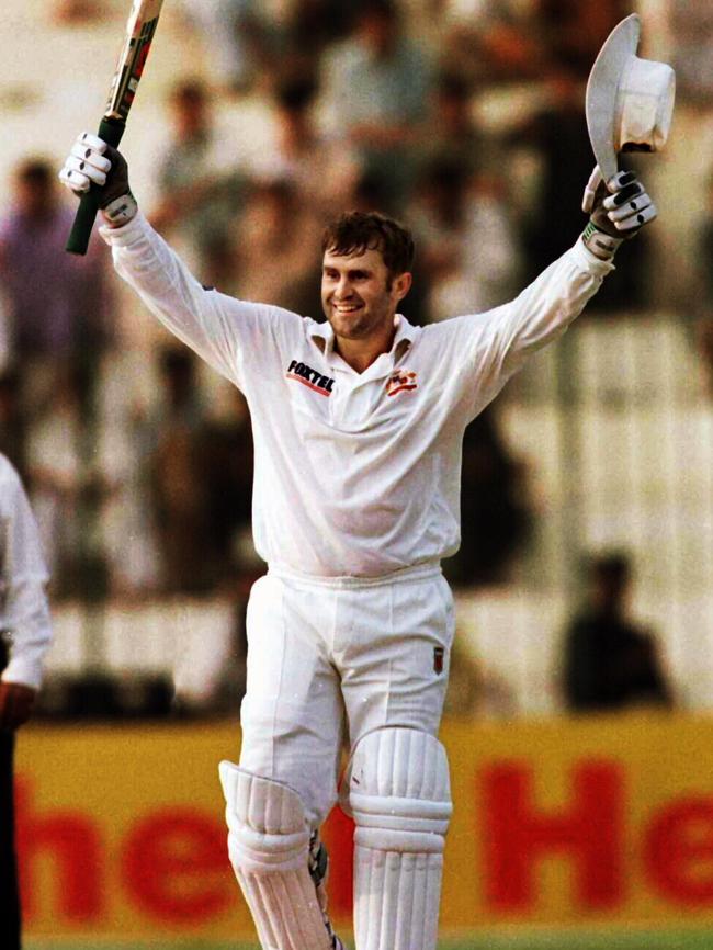 Mark Taylor celebrates a triple century against Pakistan.