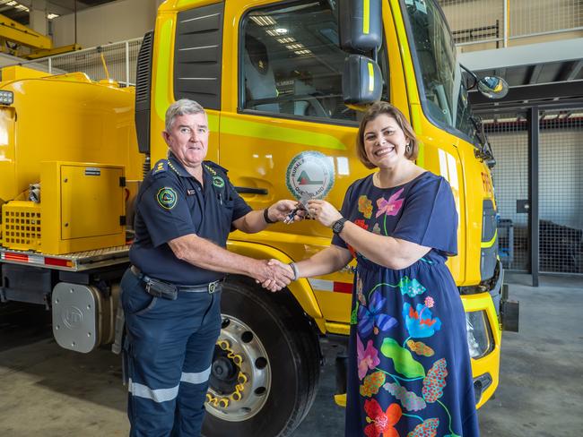 Fire and Disaster Recovery Minister Nikki Boyd hands over the keys to a a new 7,000-litre rural tanker for the Rangewood Rural Fire Brigade. Picture: Monique Gordon.