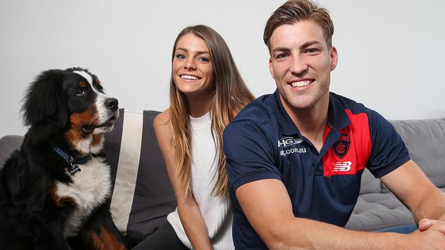 Jack Viney with his girlfriend Charlotte and their Bernese Mountain dog Sebastian. Picture: Ian Currie