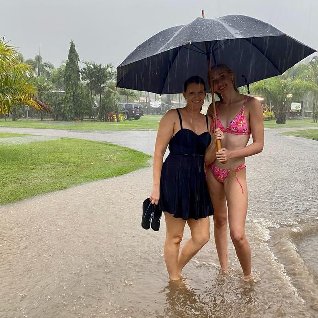 Cairns mother of three Tanya Snelling with her daughter Leah, 16 at Big4 Adventure Whitsunday caravan park during the deluge. Picture: Tanya Snelling