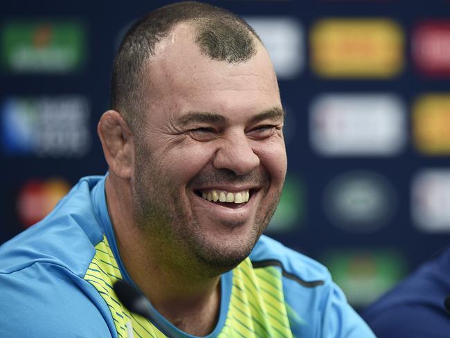 Australia's head coach Michael Cheika (L) and Australia's wing Adam Ashley-Cooper (R) deliver a press conference on October 2, 2015 at Twickenham Stadium in southwest London, on the eve of their 2015 Rugby Union World Cup match against England. AFP PHOTO / MARTIN BUREAU RESTRICTED TO EDITORIAL USE