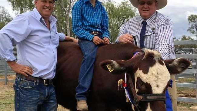 WINNING PET: Mitchell Show Society president Steve Hancock with pet parade winners Cooper Campbell and Squeaky, alongside Wayne Crompton. Picture: Mitchell Show