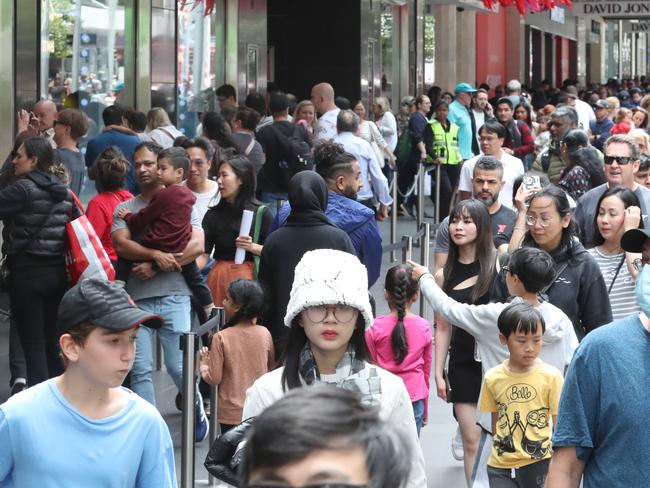 The boxing day sales in the cbd Bourke street mall. Tuesday, December 26. 2023. Picture: David Crosling