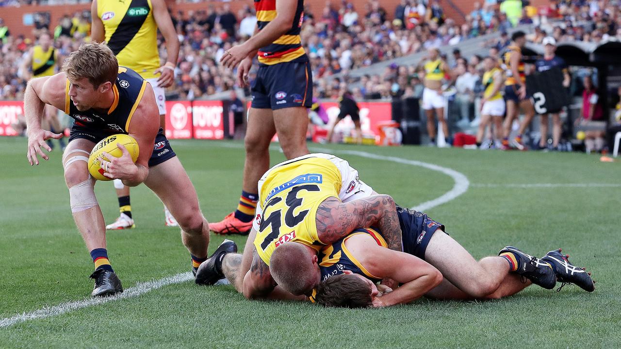 The dangerous tackle. (Photo by Sarah Reed/AFL Photos via Getty Images)