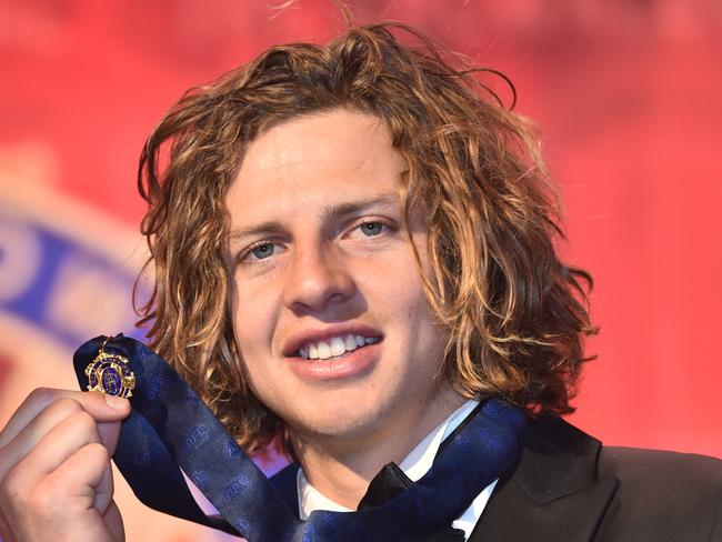 Fremantle Dockers player Nathan Fyfe reacts after winning the Brownlow Medal at Crown in Melbourne, Monday, Sept. 29, 2015. The Brownlow medal is awarded to the best and fairest AFL player in the home and away season. (AAP Image/Julian Smith) NO ARCHIVING