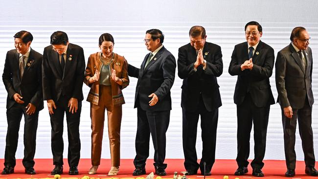 Philippines President Ferdinand Marcos Jr, left, Singaporean Prime Minister Lawrence Wong, Thai Prime Minister Paetongtarn Shinawatra, Vietnamese Prime Minister Pham Minh Chinh, Japanese Prime Minister Shigeru Ishiba, Laotian Prime Minister Sonexay Siphandone and Malaysian Prime Minister Anwar Ibrahim at the 27th ASEAN-Japan Summit in Vientiane. Picture: AFP