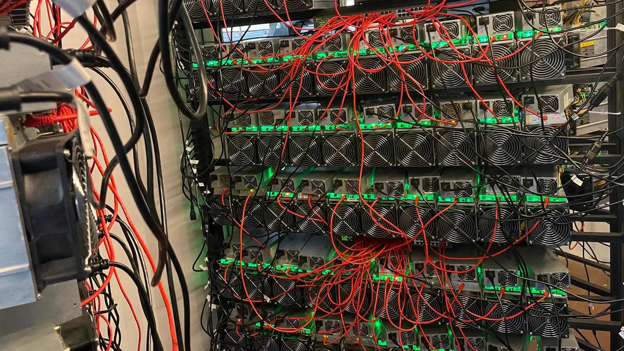 Mining bitcoin and other cryptocurrencies requires masses of computers dedicated to guessing lengthy hexadecimal numbers – an endeavour that globally consumes more electricity than entire nations. Picture: AFP Photo / Matt Lohstroh/ Ho
