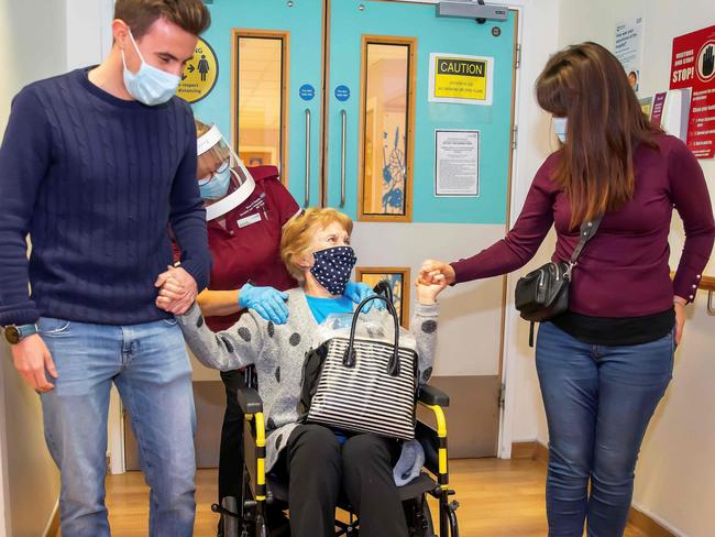 Margaret Keenan (C), 90, was the first patient in the United Kingdom to receive the first of two doses of the Pfizer-BioNtech vaccine. Picture: AFP