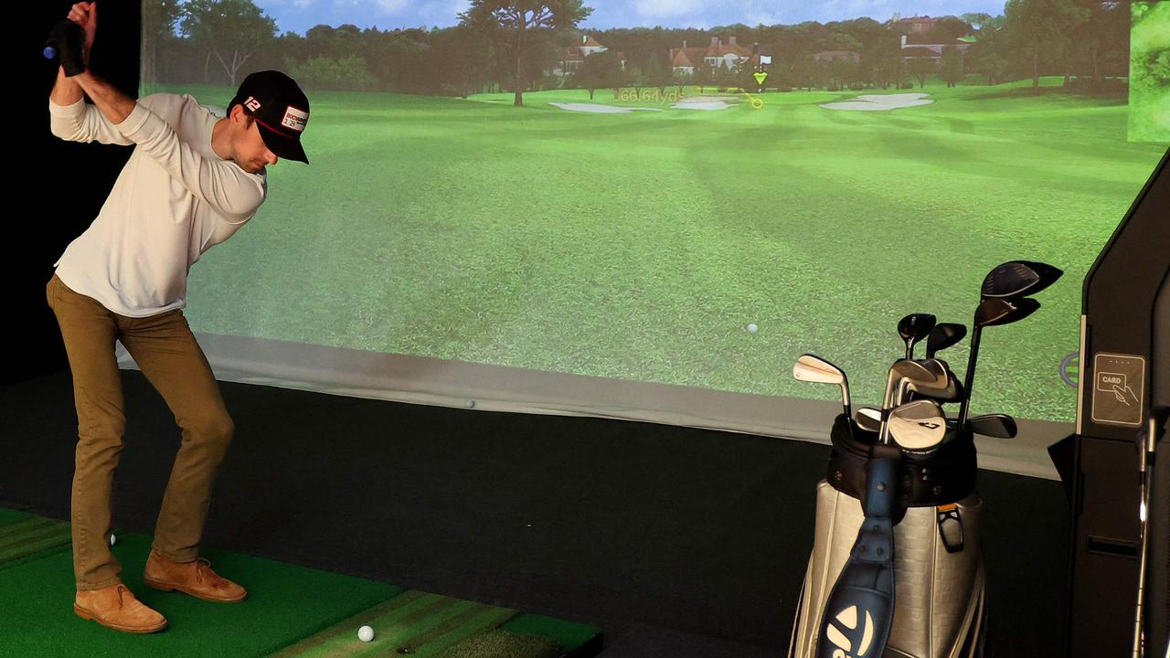 CHICAGO, ILLINOIS - FEBRUARY 27: NASCAR Cup Series driver Ryan Blaney plays on a golf simulator at Barstool Sports Chicago on February 27, 2024 in Chicago, Illinois.   Michael Reaves/Getty Images/AFP (Photo by Michael Reaves / GETTY IMAGES NORTH AMERICA / Getty Images via AFP)