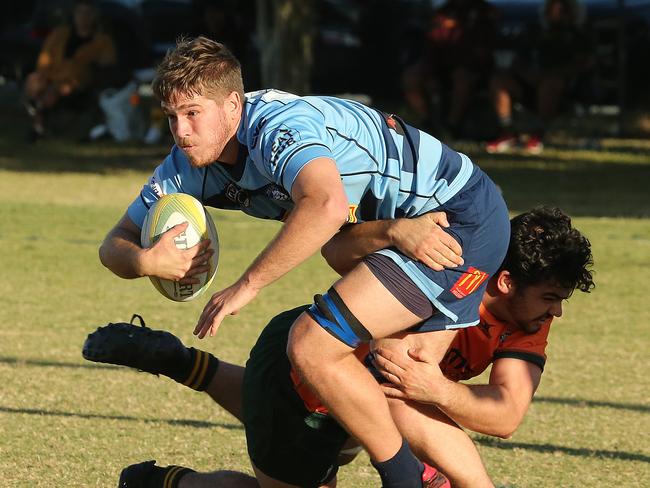 Helensvale Hogs vs Surfers Paradise Dolphins rugby union clash at helensvale hogs rugby club. Helensvale Player No7 Flynn CarsonSurfers Player No6 Jackson SearlPic Mike Batterham