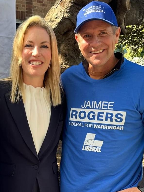 Former premier Mike Baird (right) was spotted helping Warringah Liberal candidate Jaimee Rogers.