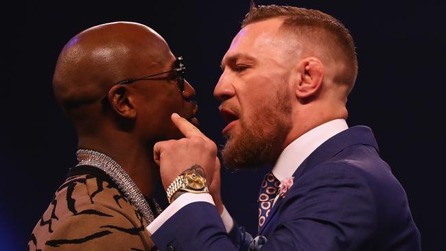 Floyd Mayweather Jr. and Conor McGregor come face-to-face.