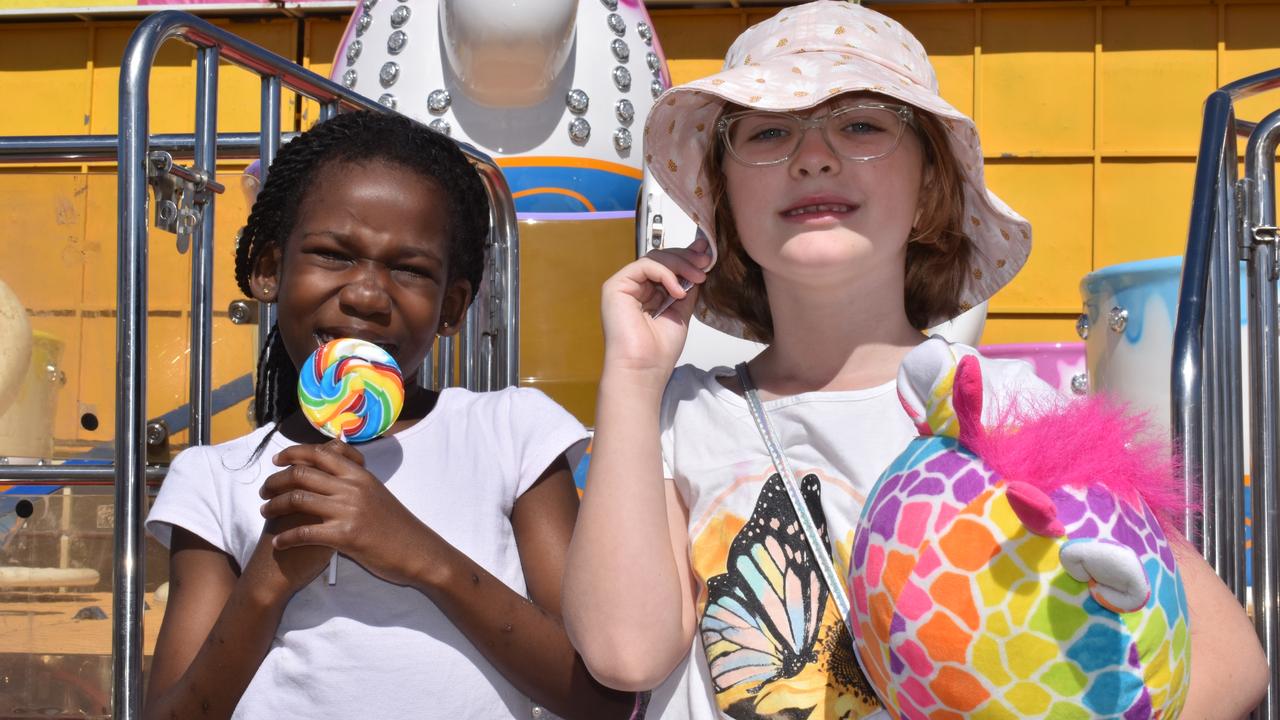 Nicole Othieno and Jessica Skinner of Bowen found some sweet treats at the Bowen Show. Picture: Kirra Grimes