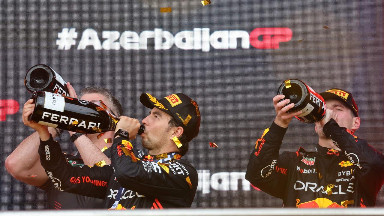 The pair celebrated Perez’s win in Azerbaijan together - before the Mexican was seemingly muzzled over a championship title fight. Picture: AFP