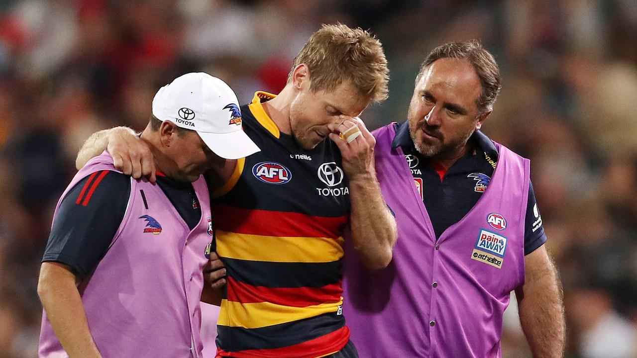 Rory Sloane comes off late with a leg injury. Picture: AFL Photos via Getty Images