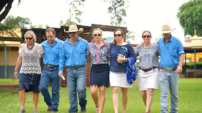 Tick Everett, Meg Everett, and Kate Everett (centre three) surrounded by family at Casuarina Street primary school after Dolly Everett's memorial service in Katherine, Northern Territory.