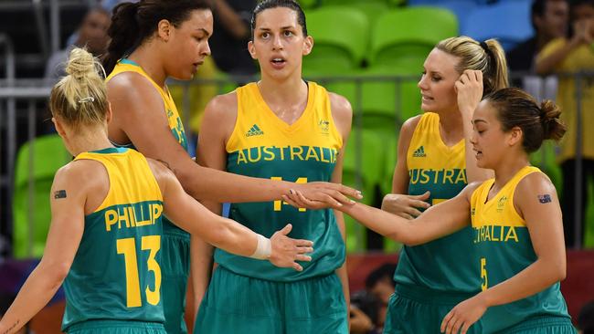 (From L) Australia's shooting guard Erin Phillips, Australia's centre Elizabeth Cambage, Australia's centre Marianna Tolo, Australia's forward Penny Taylor and Australia's point guard Leilani Mitchell react during a Women's round Group A basketball match between Japan and Australia at the Youth Arena in Rio de Janeiro on August 11, 2016 during the Rio 2016 Olympic Games. / AFP PHOTO / Andrej ISAKOVIC