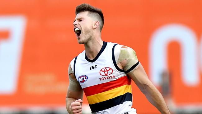 Bryce Gibbs kicks a goal against Brisbane last week. He will return to the SANFL this week. Picture: Bradley Kanaris/Getty Images