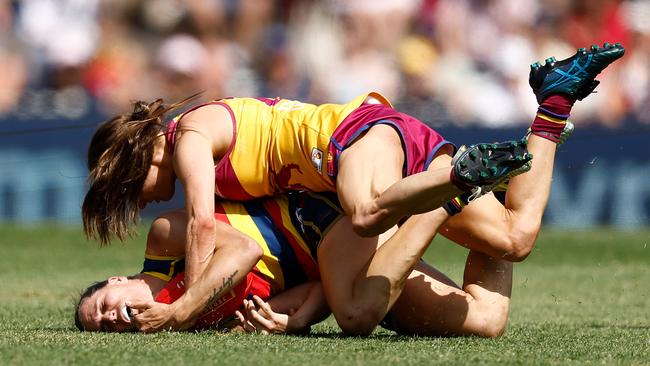 Lion Ruby Svarc takes down Chelsea Randall as Brisbane won a thriller. Picture: Michael Willson/AFL Photos