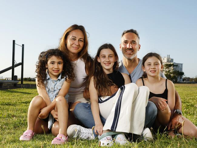 Mr Ryvchin with wife Vicki and their daughters Maya, 4, Elly, 8, Lilah, 10, at Dudley Page Reserve in Dover Heights. Picture: Jonathan Ng