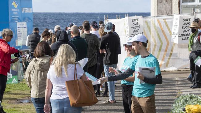 People pictured lining up to vote at Clovelly Surf Life Saving Club Picture: NCA NewsWire / Monique Harmer