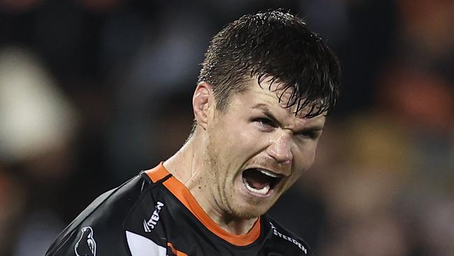 SYDNEY, AUSTRALIA - JUNE 02:  John Bateman of the Tigers celebrates after a Tigers try during the round 14 NRL match between Wests Tigers and Canberra Raiders at Campbelltown Stadium on June 02, 2023 in Sydney, Australia. (Photo by Cameron Spencer/Getty Images)