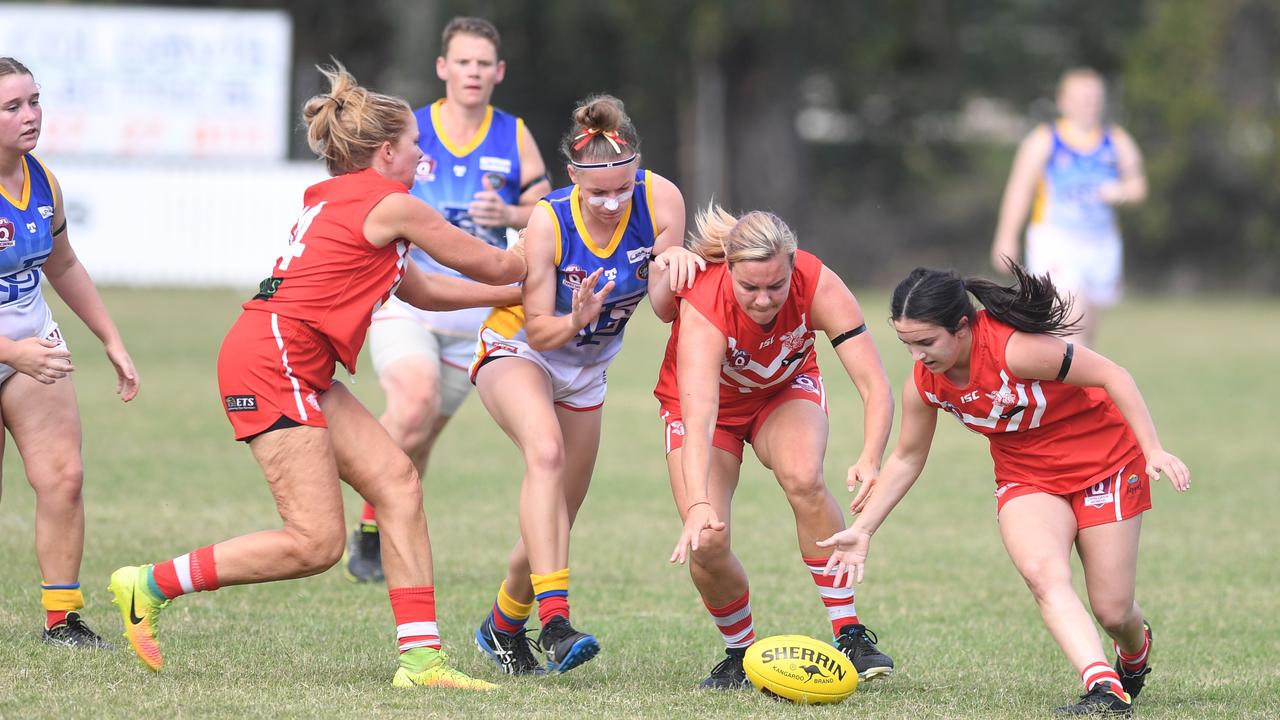 Yeppoon Swanettes Lauren Moss and Rileigh Mohamed make a determined effort in last week’s semi-final against Gladstone. Photo: Jann Houley