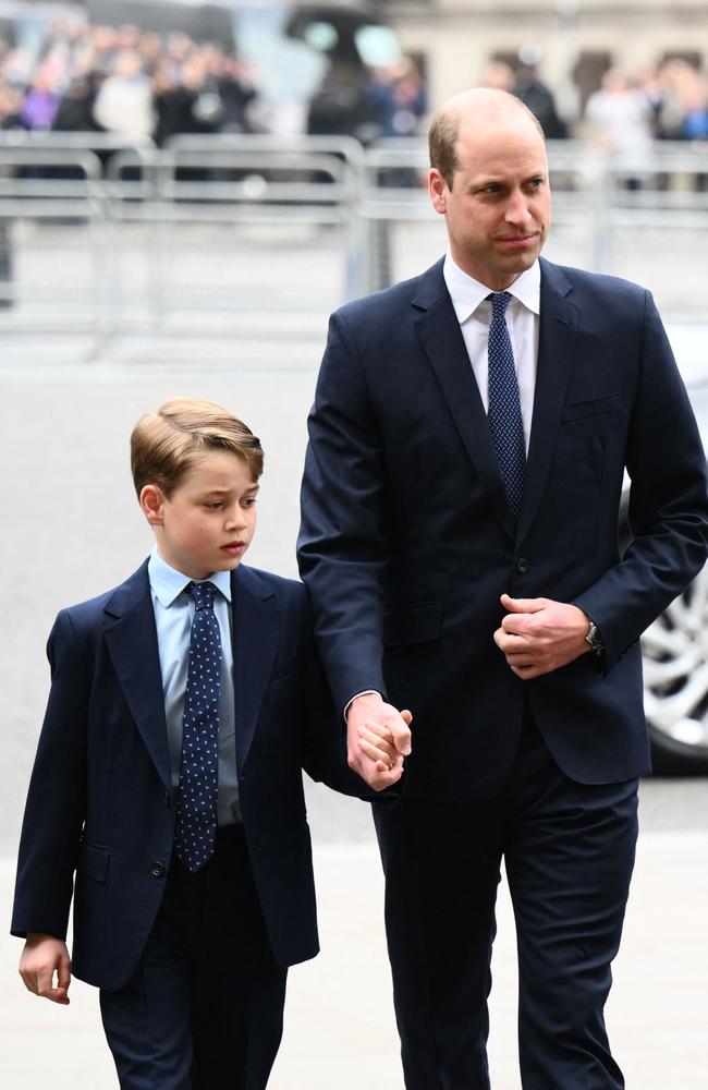 Prince William and Prince George at the service. Picture: AFP