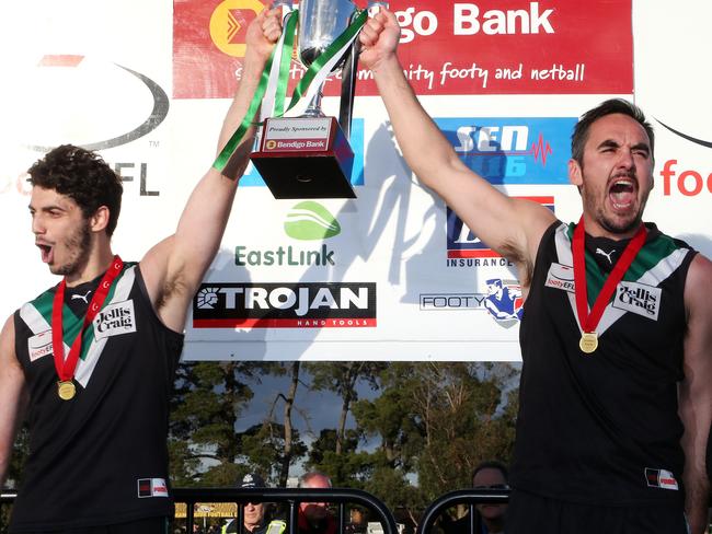 Karl Toce and Matt Fife hoist the 2017 premiership cup. Picture: George Salpigtidis