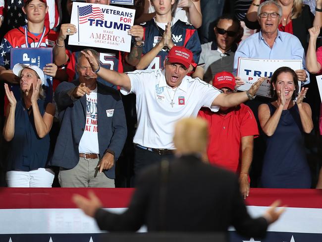 ESTERO, FL - OCTOBER 31: People cheer as President Donald Trump looks at them during a campaign rally at the Hertz Arena to help Republican candidates running in the upcoming election on October 31, 2018 in Estero, Florida. President Trump continues travelling across America to help get the vote out for Republican candidates running for office.   Joe Raedle/Getty Images/AFP == FOR NEWSPAPERS, INTERNET, TELCOS & TELEVISION USE ONLY ==